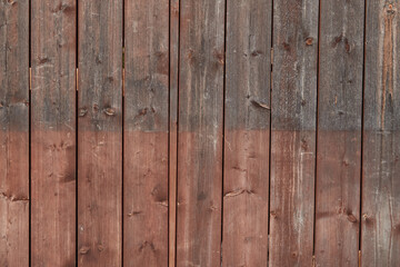 Brown wood panels from a hut in daylight. symmetrical, even. Germany.