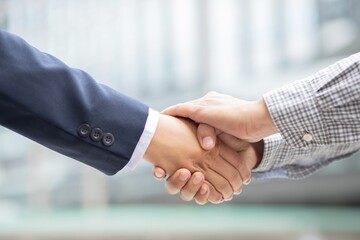 Business and Finance Concepts - Businessmen shake hands