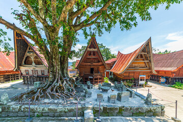Batak traditional houses in a row at Ambarita village, lake Toba, travel destination in Sumatra, Indonesia.