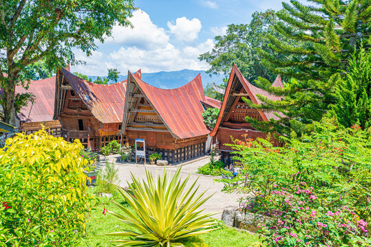 Batak traditional houses in a row at Ambarita village, lake Toba, travel destination in Sumatra, Indonesia.