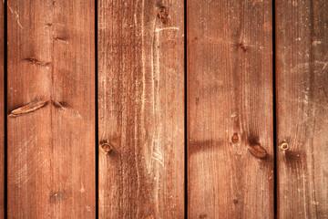 Brown wood panels from a hut in daylight. symmetrical, even. Germany.