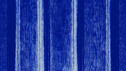 Blue rustic woody background of wooden boards. Style blue old wood background