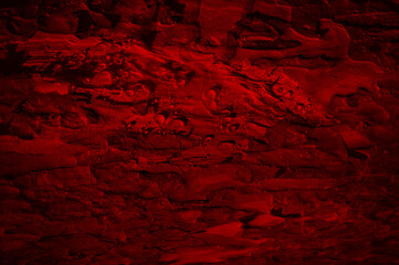 Abstract red background texture. Dark red pine bark background with drops of resin.