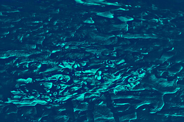 Blue background. Deep abstract sea blue strokes. Blue waves, modern art. Bright abstract background painting