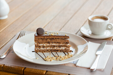 Chocolate cake served on a white plate