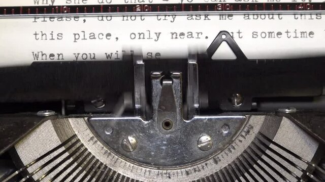 typebars and ribbon spools with type guide of old antique typewriter