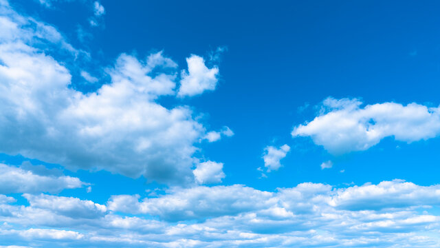 Blue sky with white clouds after a thunderstorm landscape.