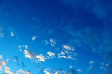 Fototapeta na wymiar Gradient Blue Sky with Clouds