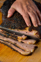 Beef Brisket barbecue Traditional Texas Smoke House . Rubbed with spiced & slow smoked in a classic Texas smoke house over mesquite wood chips in traditional classic bbq method. Chopped Beef Brisket.