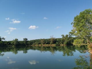 Fototapeta na wymiar Scenic View Of Lake By Trees Against Sky