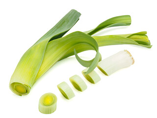 fresh leek and its pieces on a white background, top view