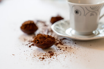 Ground coffee bean in wooden spoon and Turkish coffee