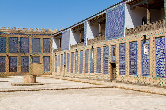 KHIVA, UZBEKISTAN - AUGUST 14, 2015: The harem courtyard in Tosh Hovl Palace, Khiva, Uzbekistan, Central Asia. Khiva was an ancient city on famous Marco Polo Silk Road.