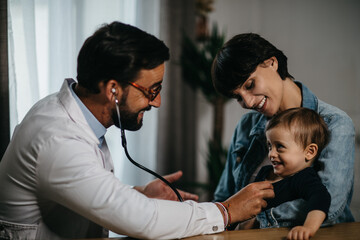 a doctor giving a consultation to a baby