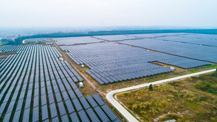 Aerial photography of modern large-scale photovoltaic solar panels.