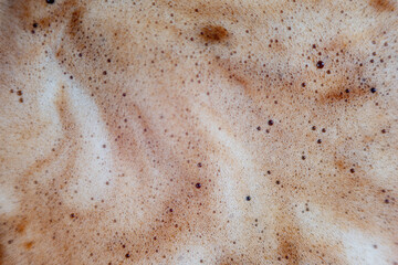Fototapeta na wymiar Macro bubbles of black coffee foam