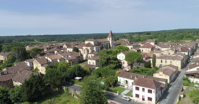 Monpazier aerial lateral travelling, Dordogne, labelled Les Plus Beaux Villages de France