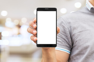 Man holding mobile smart phone with blank screen