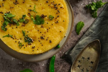 Homemade Dhokla - Steamed svaory cake with chickpea flour, selective focus