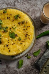 Homemade Dhokla - Steamed svaory cake with chickpea flour, selective focus