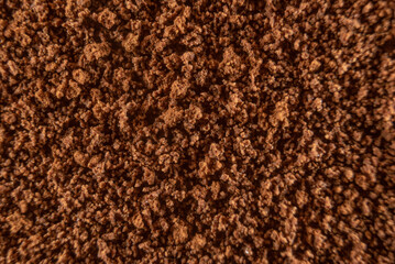 Fullscreen macro closeup with shallow depth of field of instant coffee powder. Texture. Graphic design.