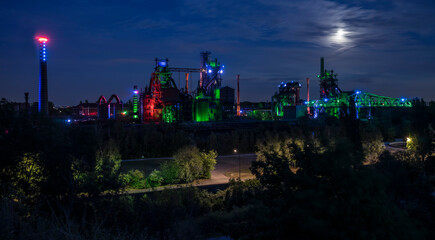 illuminated steelworks in Duisburg now used as a park