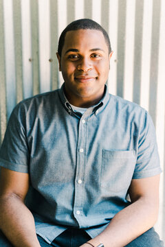 Portrait of young man smiling with braces