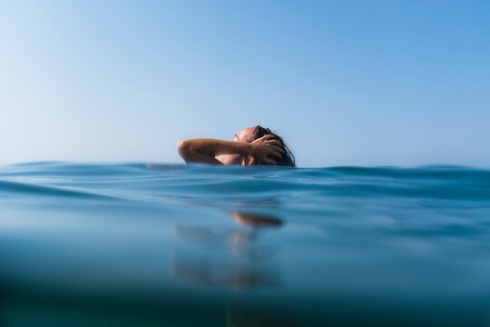 Woman relaxing in the ocean