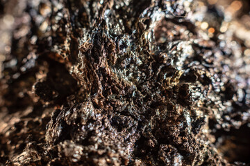 Macro of slag or volcanic magma stone texture, similar to a landscape of a strange space planet
