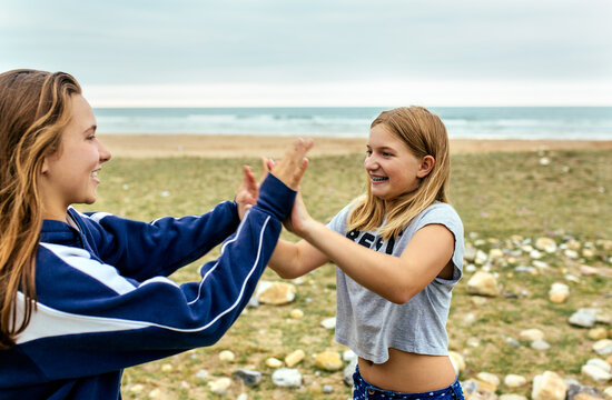 Four sisters playing outdoors