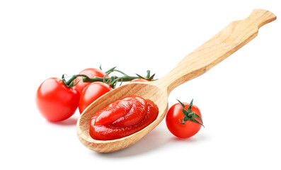 Ketchup in a spoon and cherry tomatoes on a white background. Isolated