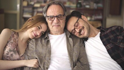 Young son and daughter embracing his father with love	
 - Powered by Adobe