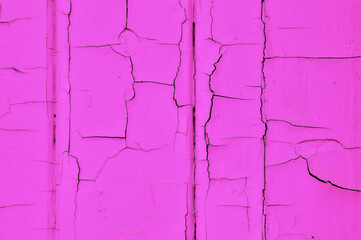 Old paint texture with cracks, an old pink door.