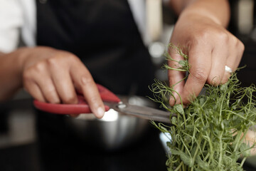 Unrecognizable Woman Taking Herbs
