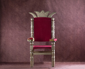 royal throne with crown on a red background