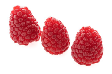 ripe raspberries isolated on a white background