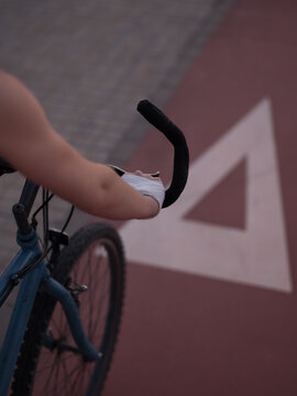 Anonymous cyclist riding bike on track
