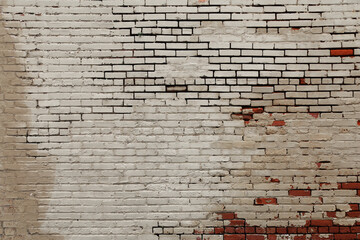 faded old white painted red brick wall background