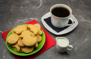 Homemade cookies and coffee with milk as a background for text