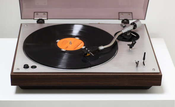 Vintage turntable with spinning record