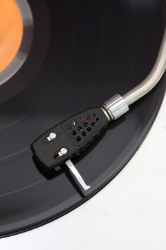 Vintage turntable with spinning record