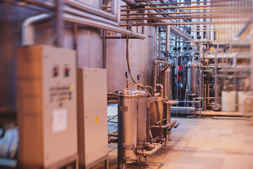 Interior of distillery winery brewery equipment, inside wine factory, process of alcohol liquor manufacture production