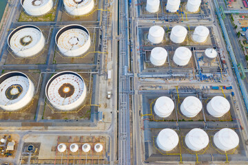Top view of oil refinery plant chemical factory and power plant with many storage tanks and pipelines in industrial estate