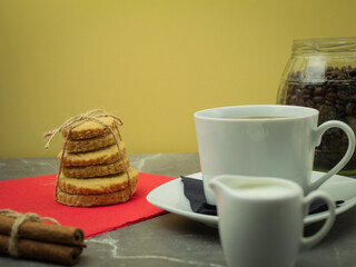 Homemade cookies and coffee with milk as a background for text