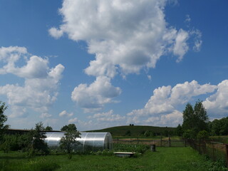 counryside and blue sky with clouds