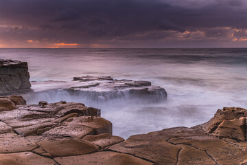 Rain Clouds and a Sunrise Seascape