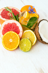 Fresh citrus fruits and coconut