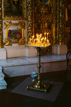 Lit candles and icons