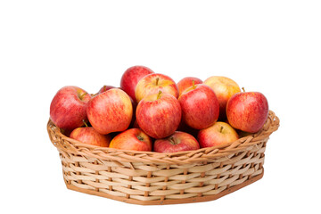 red apples in wicker basket on isolated white background