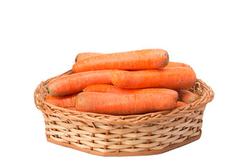 carrots in wicker basket on isolated white background
